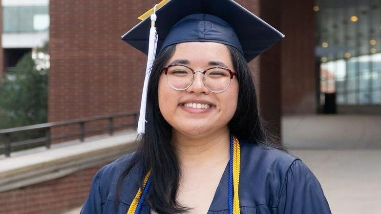 Penn State Student In cap and gown