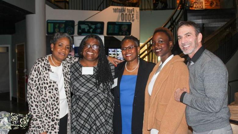 L-R: Sope Lartey, Drexel University undergraduate student, author of "An Ode to Dr. Richardson"; Dr. Tina Q. Richardson, PSU-LV Chancellor; Kristine Lewis Grant, CCUE Co-Chair; Sherri Manson, CCUE Co-Chair. 