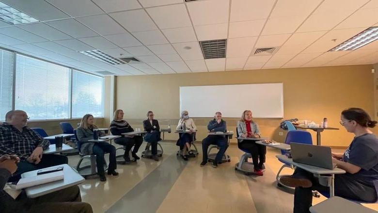 PSU-LV Faculty and Staff sitting in brainstorm circle