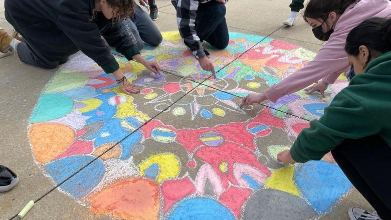 Students work on mandala project. 