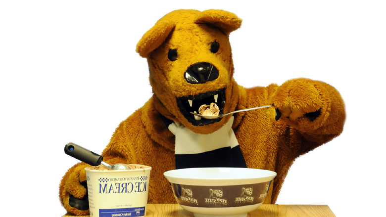 The Nittany Lion mascot digs in to a bowl of Berkey Creamery Ice Cream