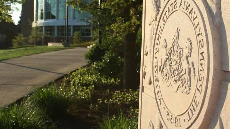 The Pennsylvania State University seal in back of the HUB